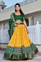 Women's Yellow & Green Heavy Lichi Silk Lehenga Choli with Jacquard Print, Zari Work & Designer Dupatta